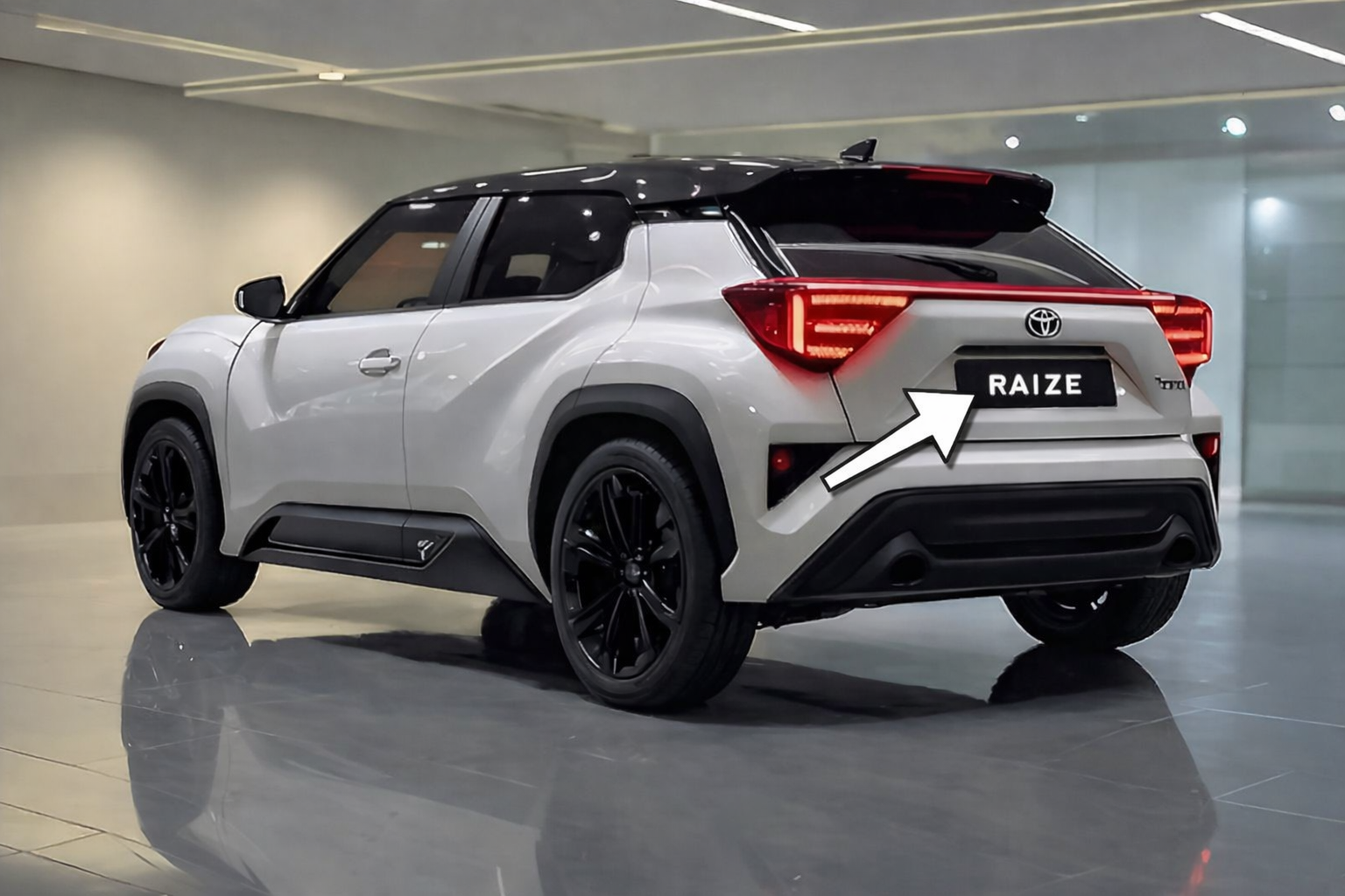 Toyota Raize rear view with arrow pointing towards the RAIZE number plate in a modern showroom
